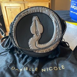 Danielle Nicole Chamber of Secrets Snake door purse.